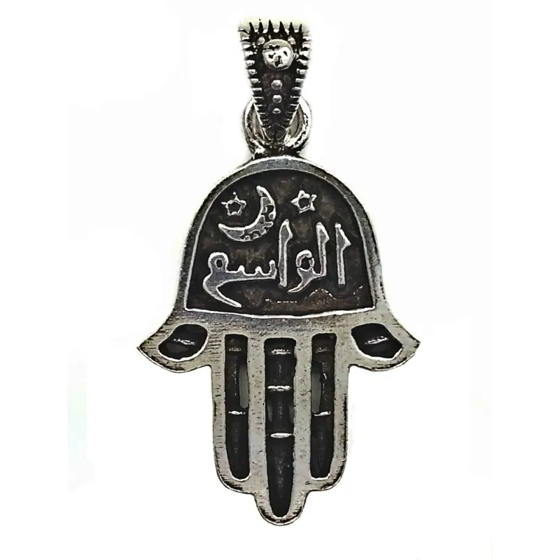 pendentif en argent de la main de Fatma porte bonheur .-bijouxbijoux.ch